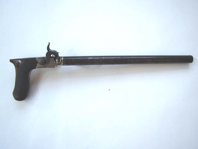 An English percussion 'boot' pistol by William Westley Richards, Gunmaker to Prince Albert, circa 1840-1850.